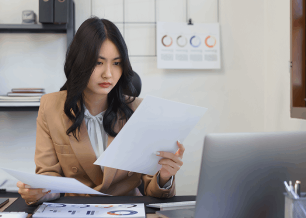 Professional certified translator working on real estate docs in NY, ensuring the accuracy of property contracts and deeds.