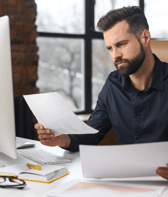 Customer with certified translations of vital documents, including birth certificates and marriage records.